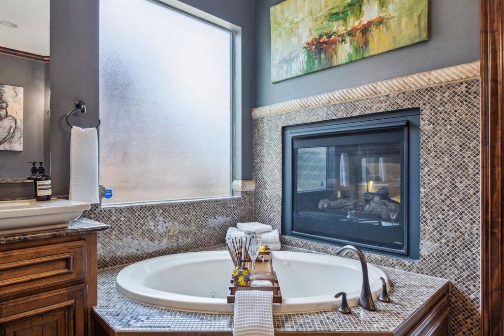 Both vanities boast Exotic Granite that is offered throughout the home.