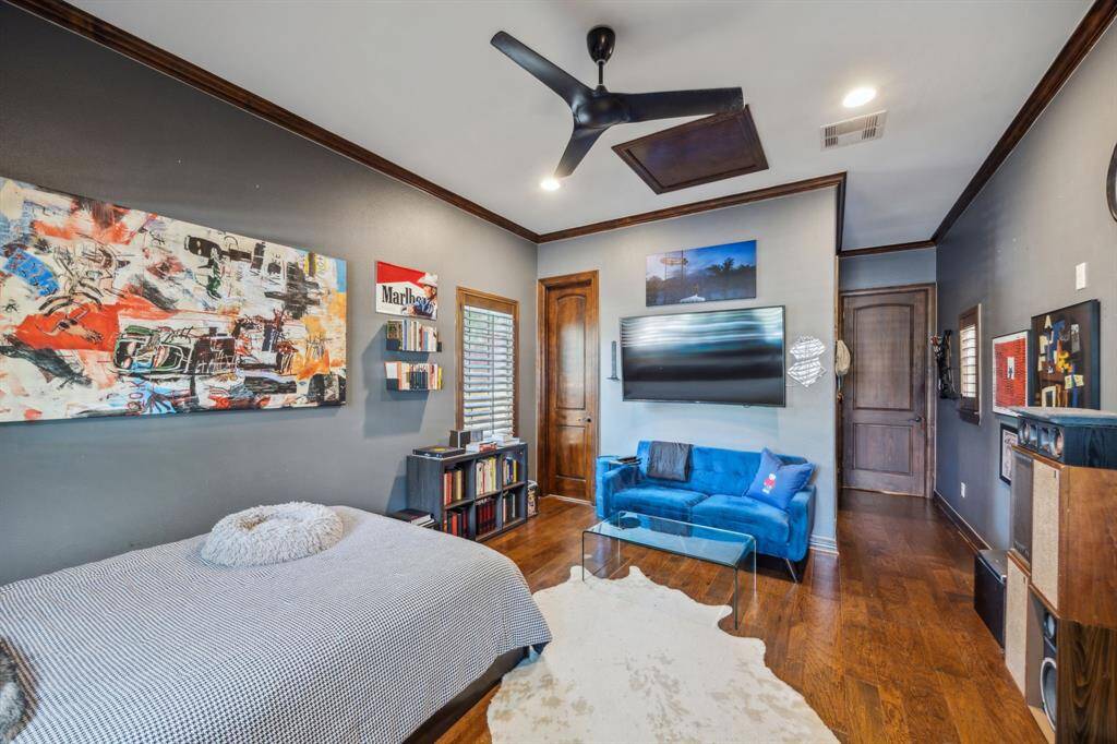 This spacious En-suite secondary bedroom on the first floor offers exceptional privacy with its own private access door leading directly to the courtyard. Inside, the room connects seamlessly to the study and is bathed in natural light, featuring beautiful wood floors and a generous walk-in closet; deal for an older child or guest seeking both comfort and convenience.