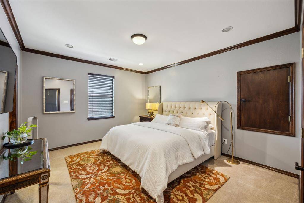 This thoughtfully designed desk area, situated on the second floor, provides an ideal personal space for kids to focus on homework and creative projects. The adjoining hall gracefully leads to the bedrooms, creating a seamless and functional flow throughout the upper level.