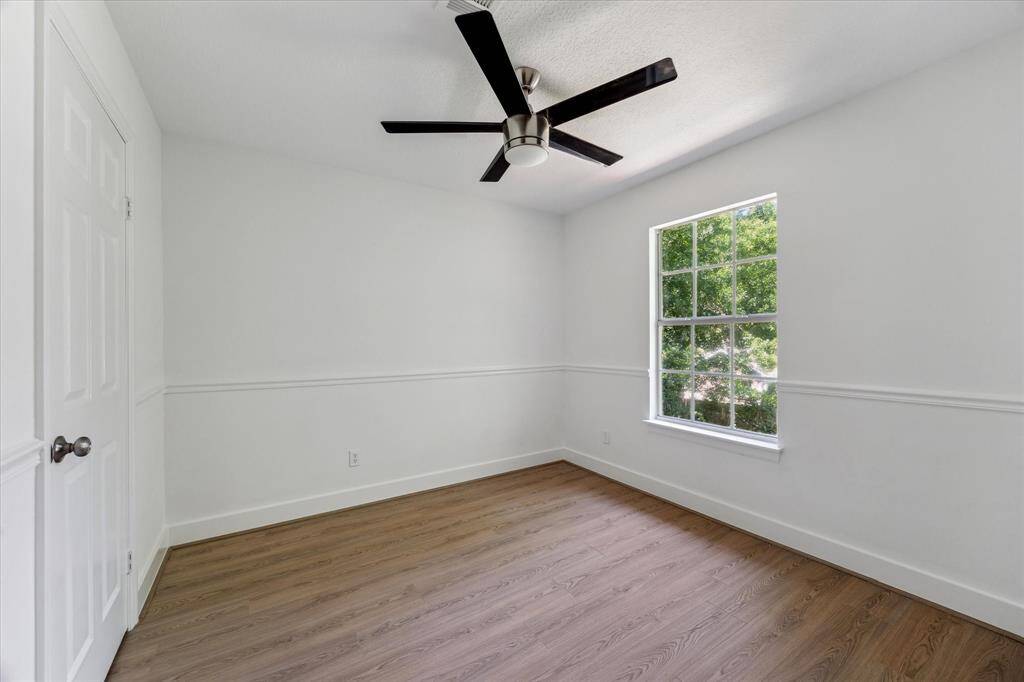 The third secondary bedroom has great views of the backyard.