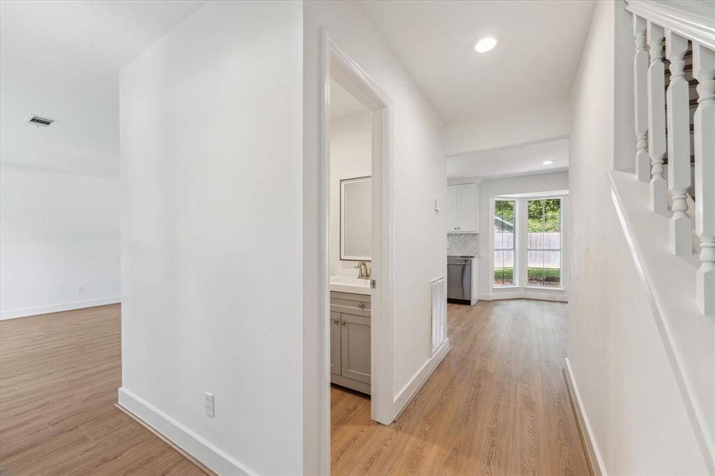 Freshly painted with new flooring , throughout. New everything. No carpet , lots of natural light.
