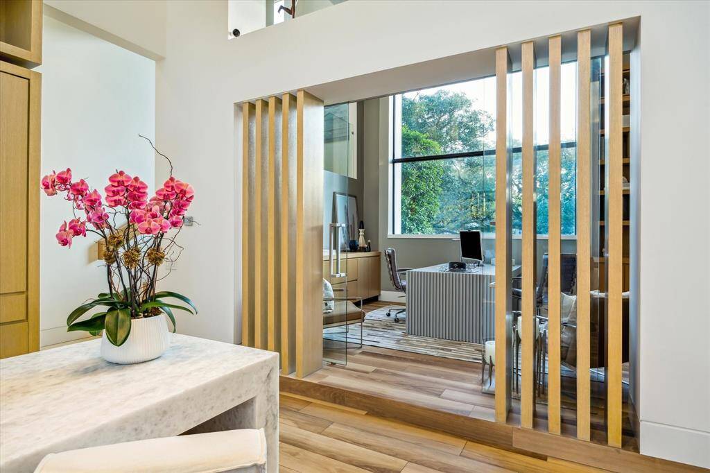 Incredible white oak woodwork through out the home and ceramic tile from Italy.