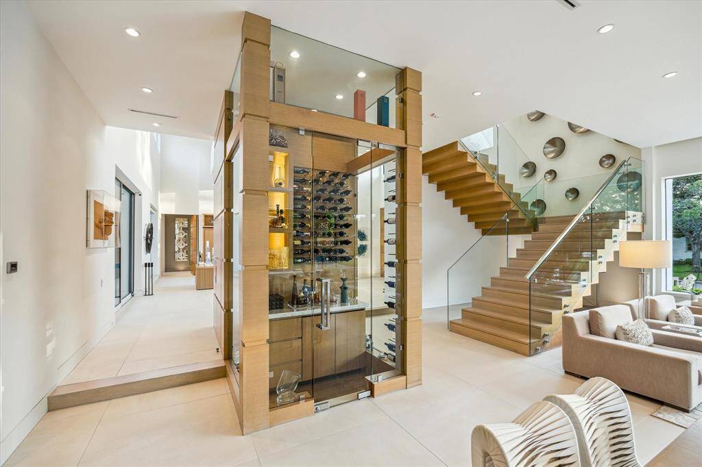 Elegantly appointed, the wine room offers the perfect space to display and enjoy your collection.