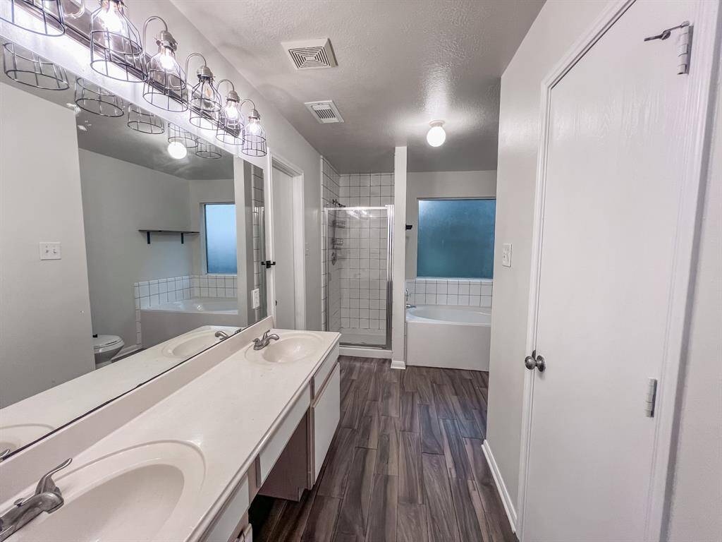 Primary bathroom has 2 closets!