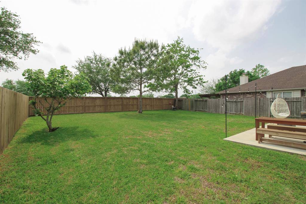 Updated fencing around the HUGE backyard!