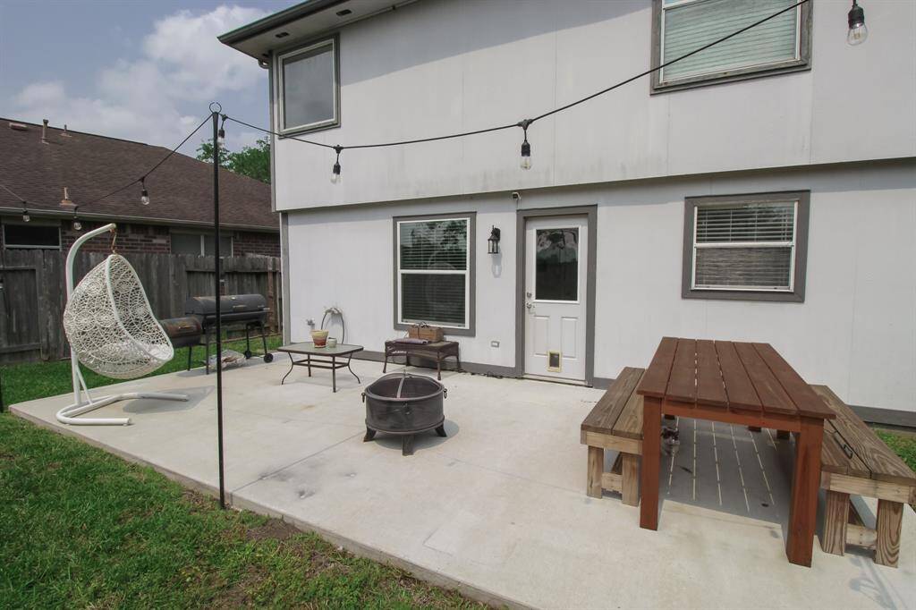 Large back patio is perfect for outdoor gatherings.