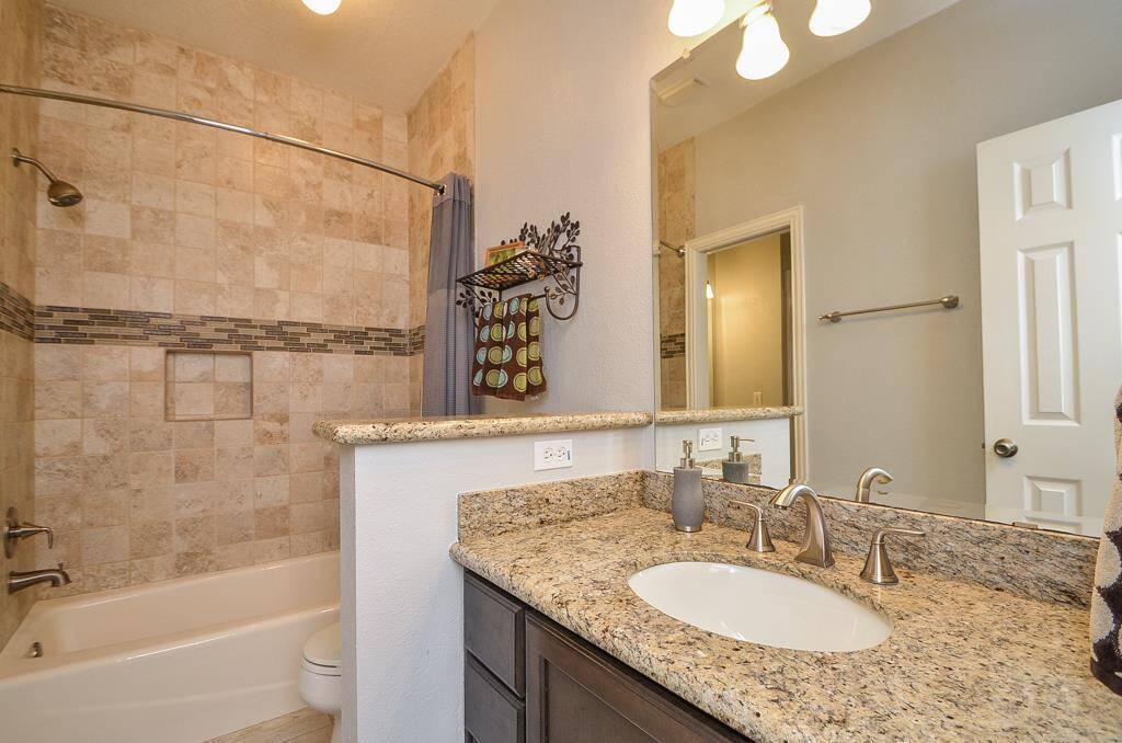 Granite in the remodeled secondary bathrooms