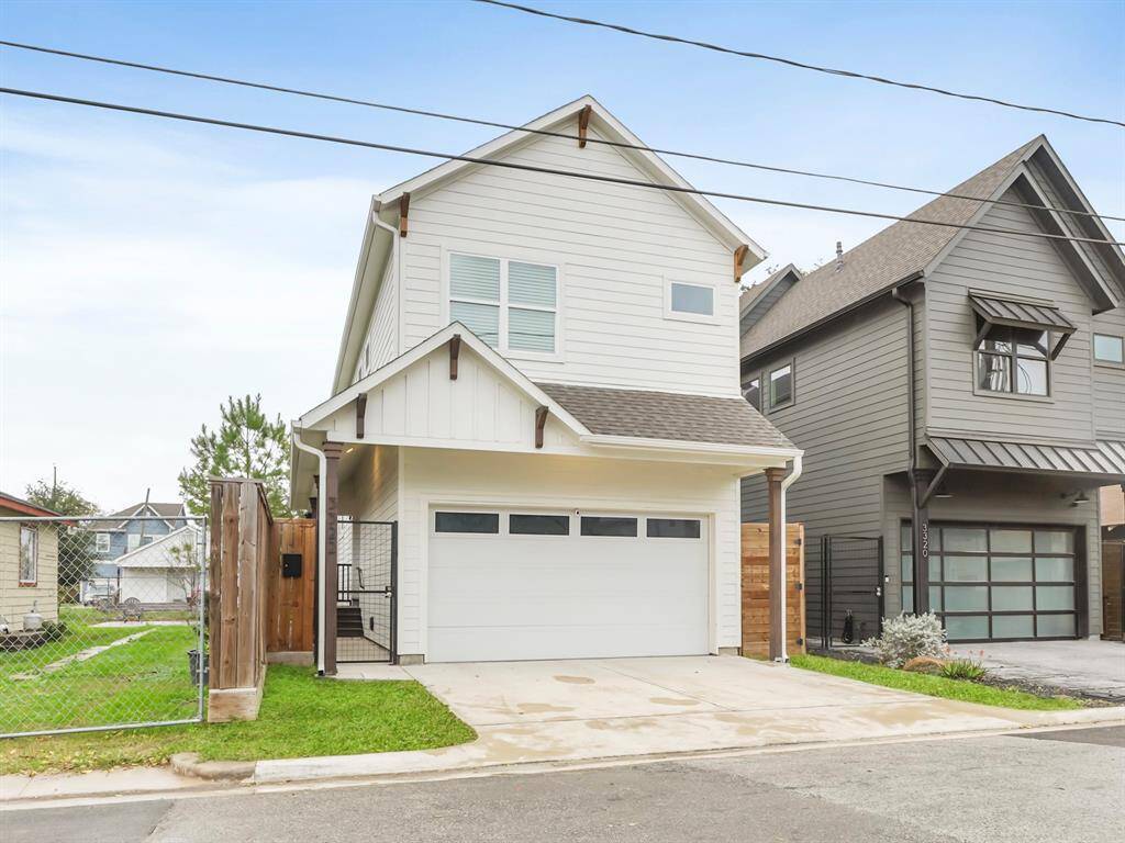 Private driveway, auto garage door opener, and privacy gate for your convenience.