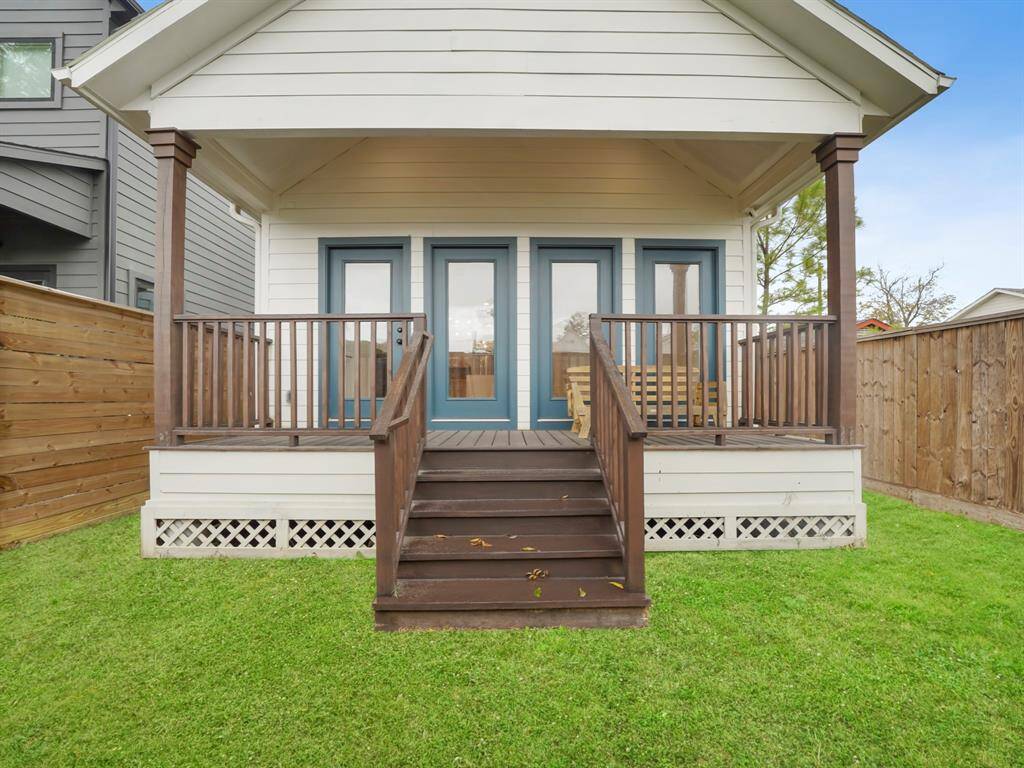 Step outside and relax in the comfort of your covered back porch! This inviting space provides the perfect setting for enjoying the outdoors while staying sheltered from the elements. Whether you're sipping your morning coffee, hosting a barbecue with friends, or simply unwinding after a long day, this covered porch offers a cozy retreat right in your own backyard. Welcome to a space where outdoor living meets comfort and relaxation.