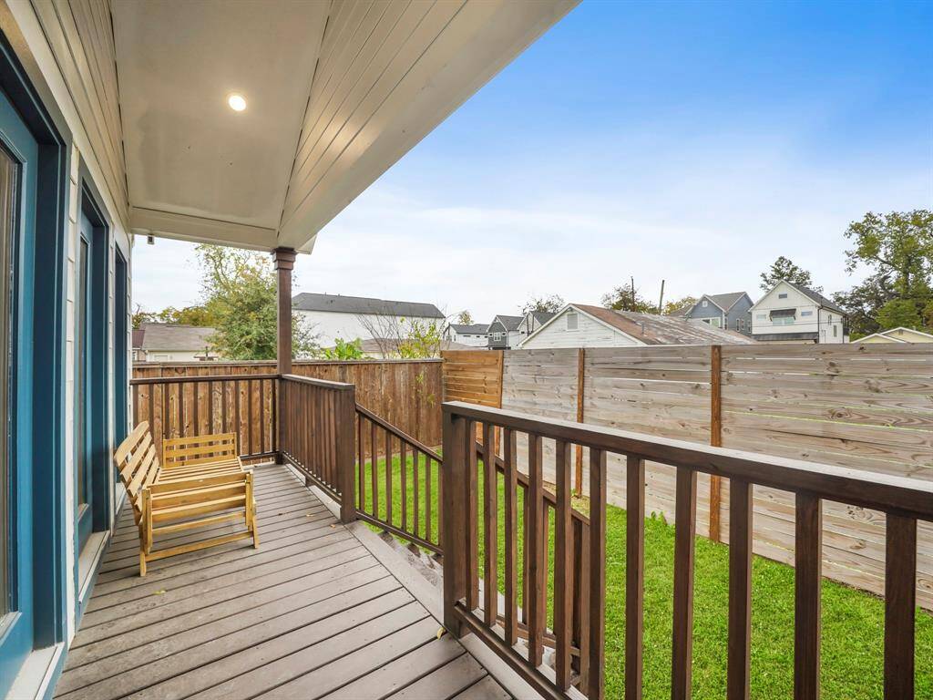 A view of the backyard from the covered back porch.