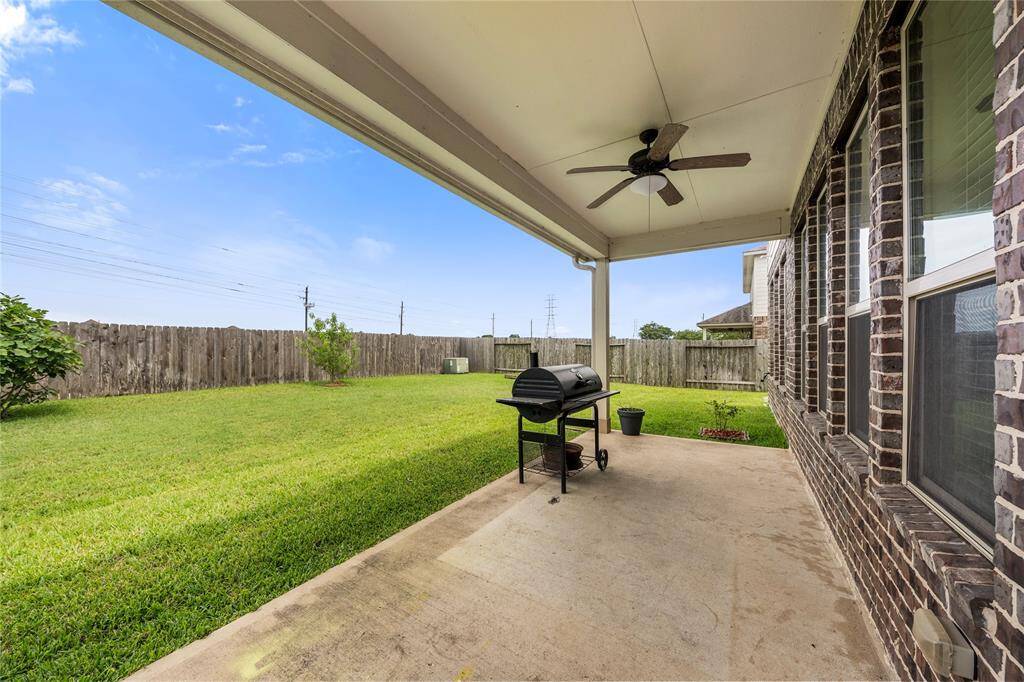 The backyard offers a private outdoor space with no rear neighbors, providing a serene setting for relaxation or outdoor activities.
