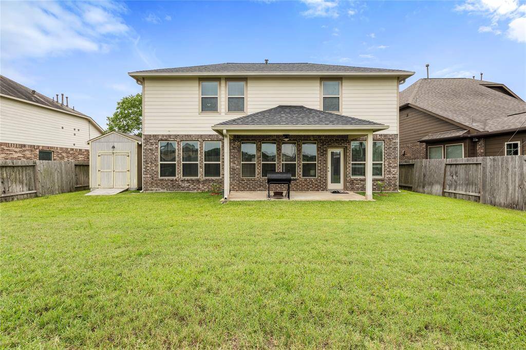 The backyard offers a private outdoor space with no rear neighbors, providing a serene setting for relaxation or outdoor activities.
