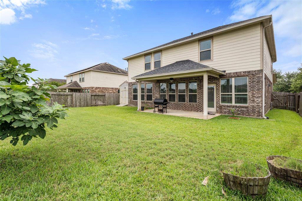 The backyard offers a private outdoor space with no rear neighbors, providing a serene setting for relaxation or outdoor activities.