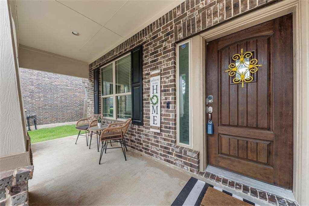 Upon entering, you're greeted by a grand foyer with soaring ceilings and abundant natural light, setting a welcoming tone for the rest of the home