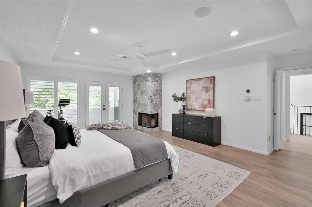 The travertine patio and wood ceiling epitomize elegance and ambiance.
