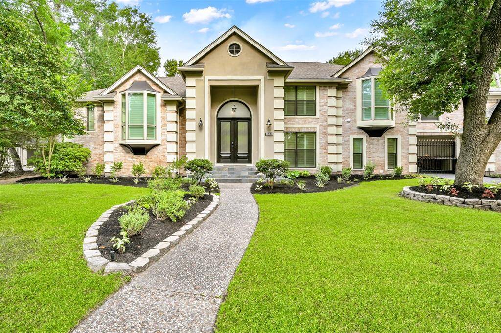 With over 5,100 Sq Ft of modern elegance, this home features 5 bedrooms, 4 full bathrooms, and 2 half baths.