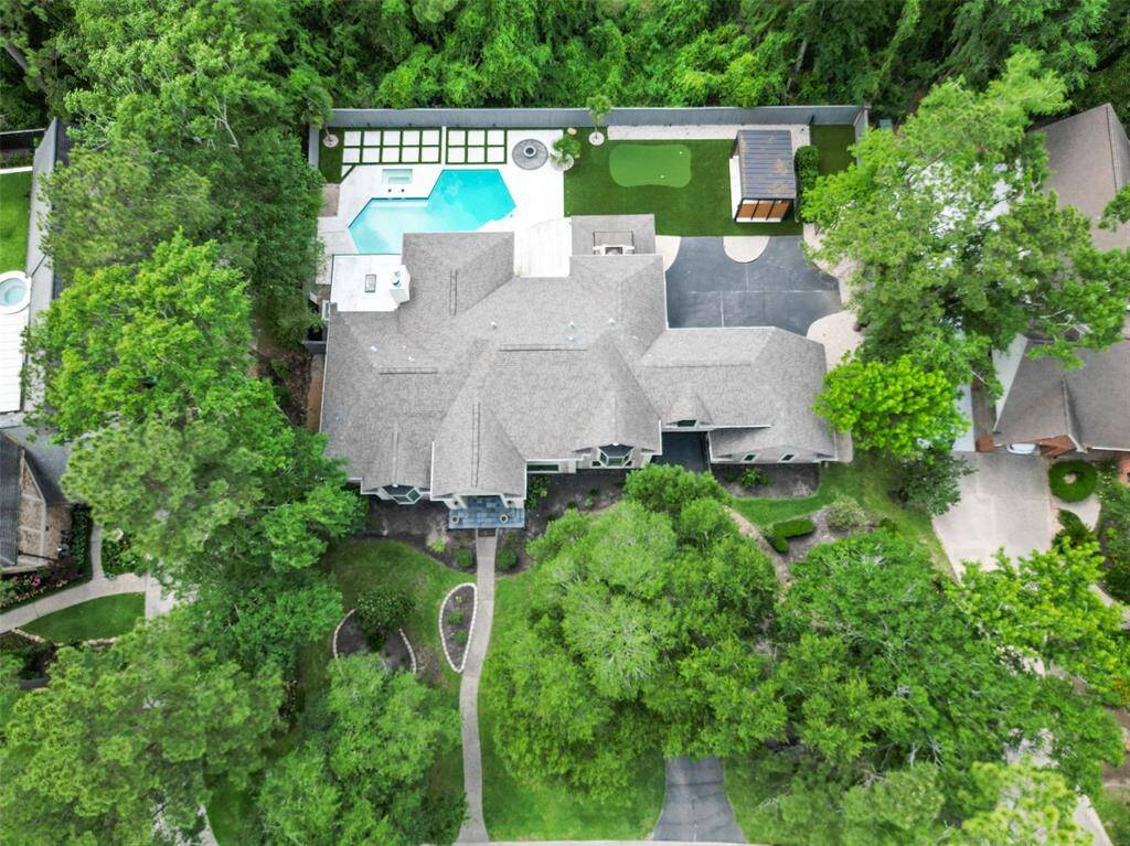 The property offers privacy plus abundant outdoor entertainment space, including a putting green!