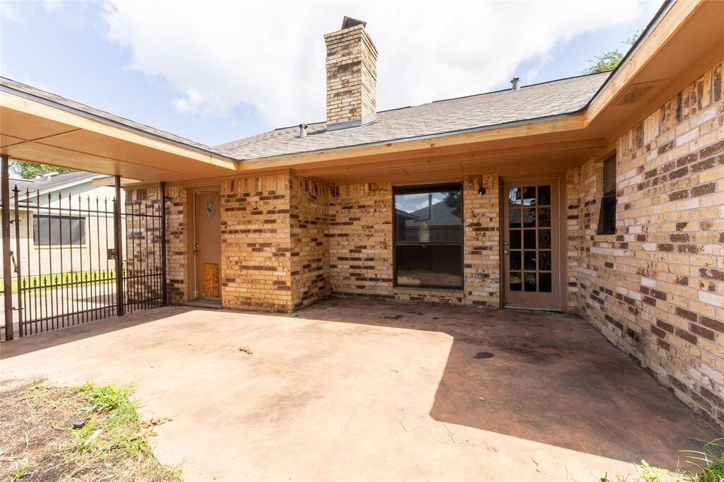 back patio and gate to driveway