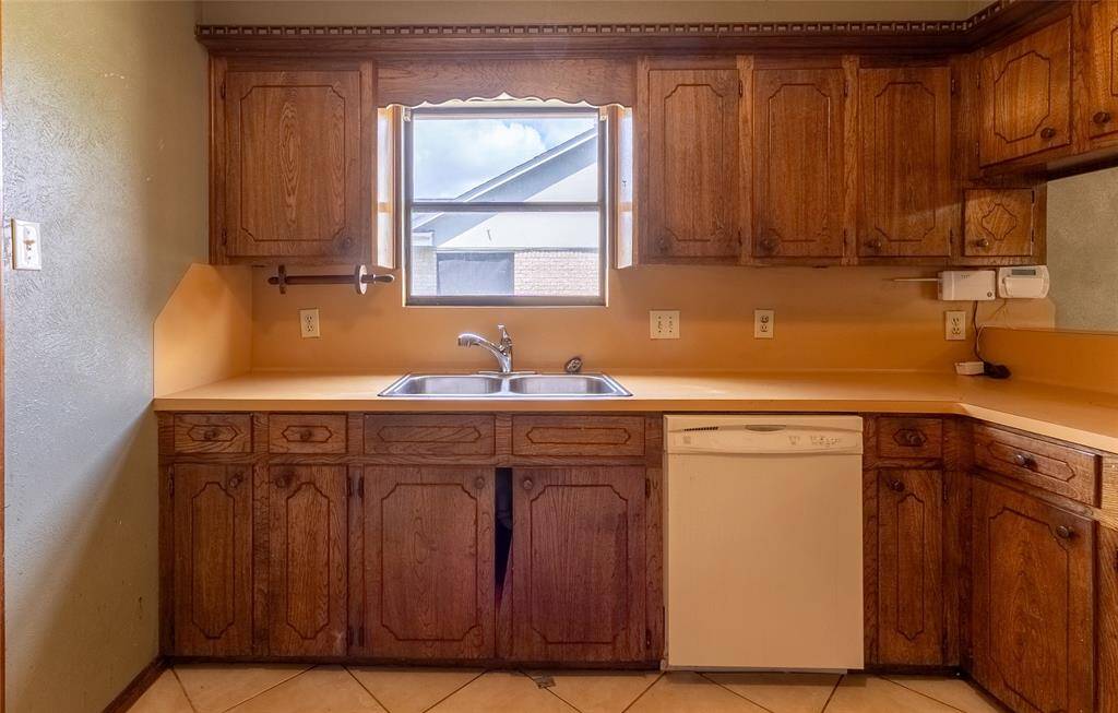 Kitchen - will be updated with granite counter tops ,new appliances, and new cabinets