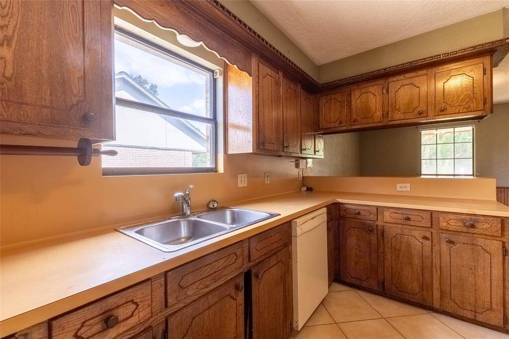Kitchen - will be updated with granite counter tops ,new appliances, and new cabinets