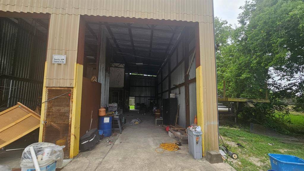 Lot has wood fence on back and chain link fencing on sides.