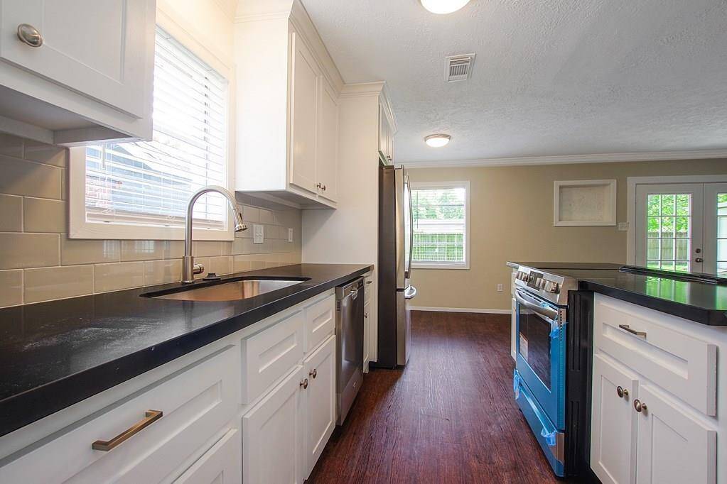 Window in the newly remodeled kitchenallows for beautiful natural light.