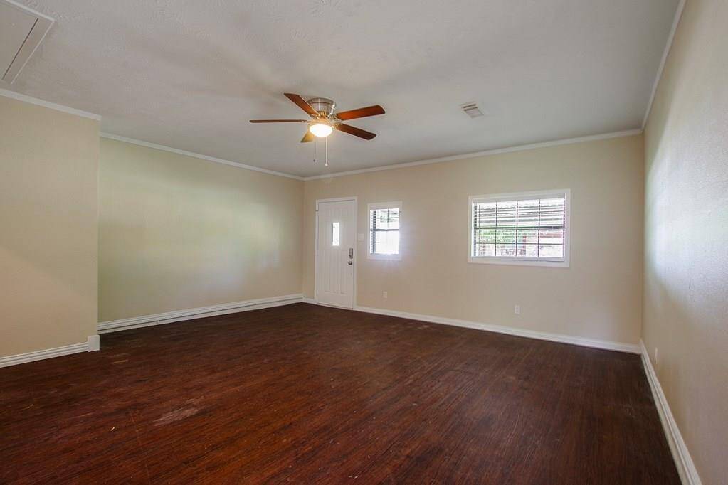 Spacious room with hard wood floors,and great wall space
