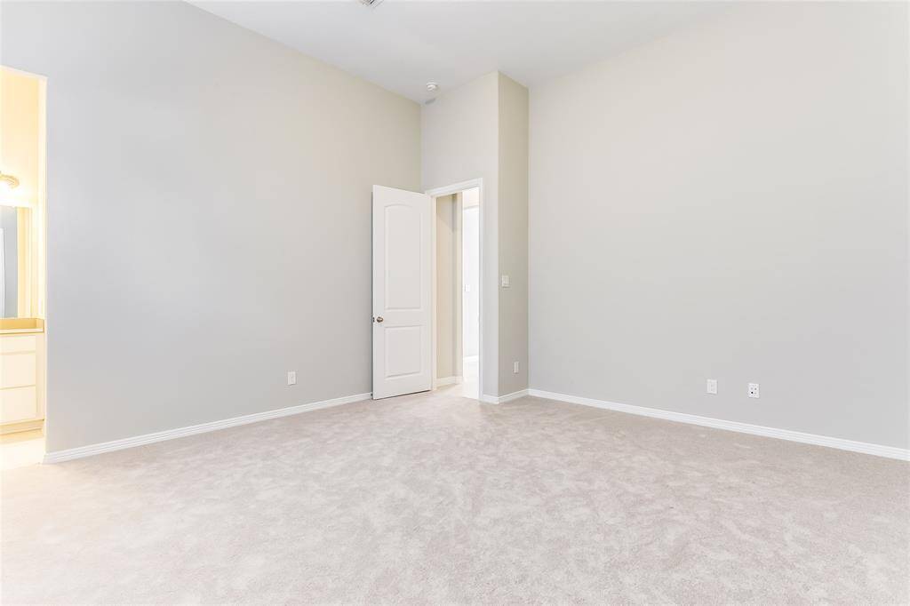 An additional view of this Spacious Secondary Bedroom that offers easy access into the beautiful Jack and Jill bathroom.