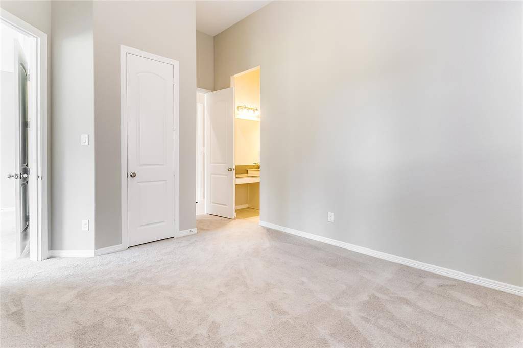 Striking Secondary Bedroom offers easy access to the Jack and Jill bathroom and is accompanied with Plush Carpeting!