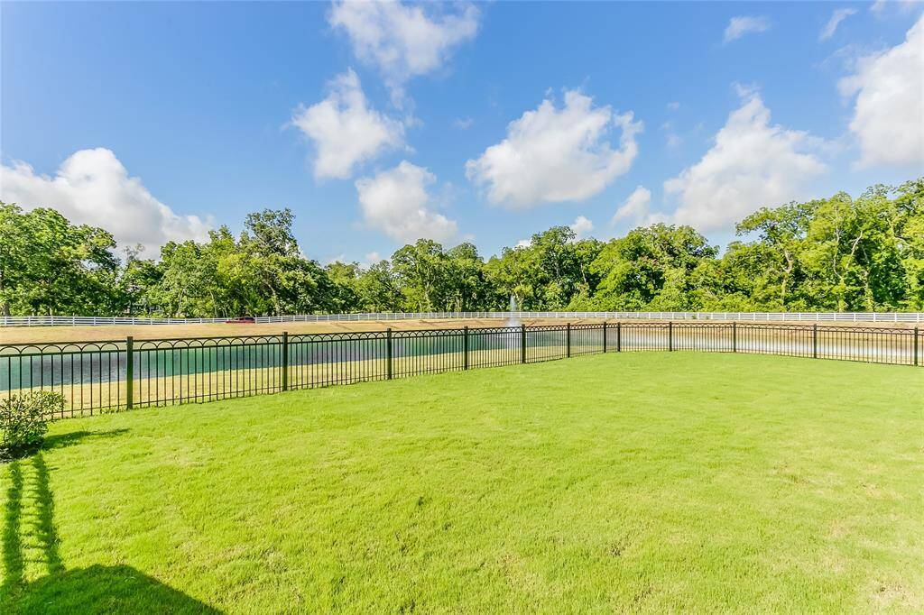And just look at that view! You just can't beat having a lake that wraps around your home on two sides!