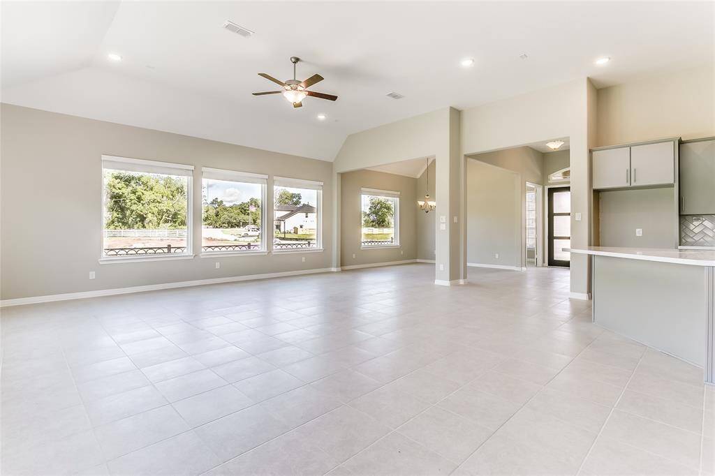 Just notice how open this floor plan is, connecting the dining, kitchen and living room allowing for easy conversation throughout the home!