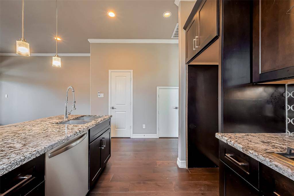 The granite countertops throughout the home are a neutral color so it works with any kind of decor.