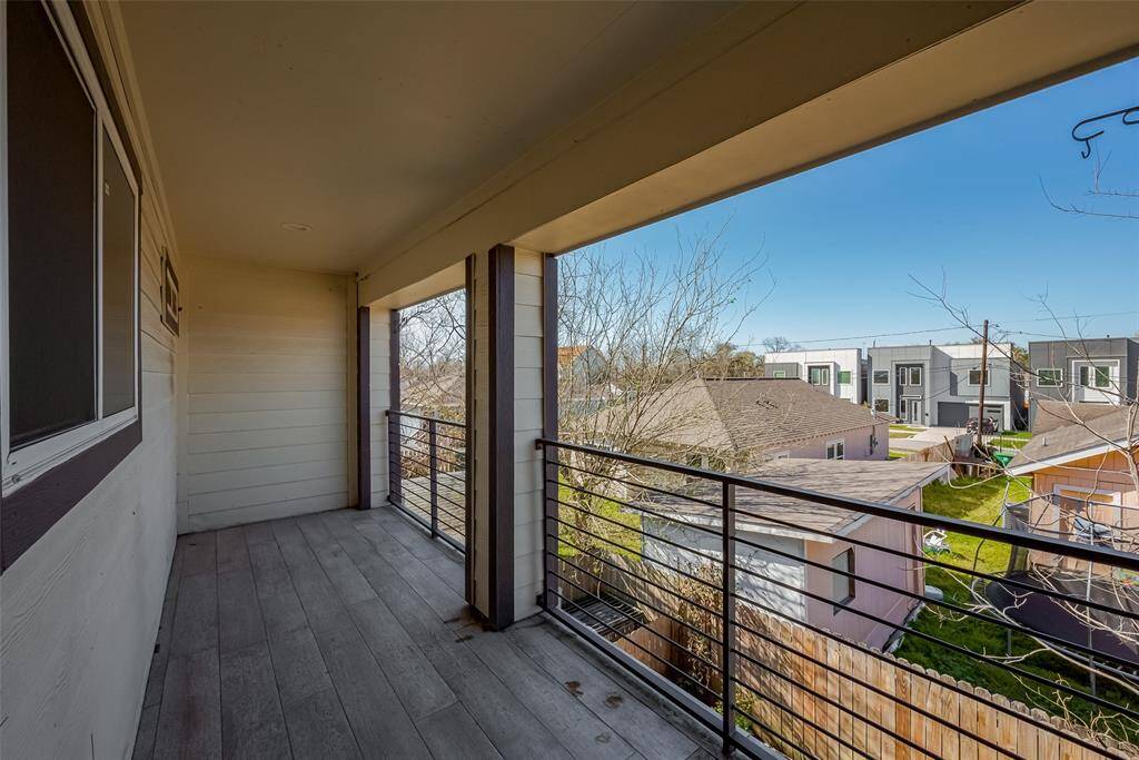 This large balcony is attached to room #2 overlooking the backyard.