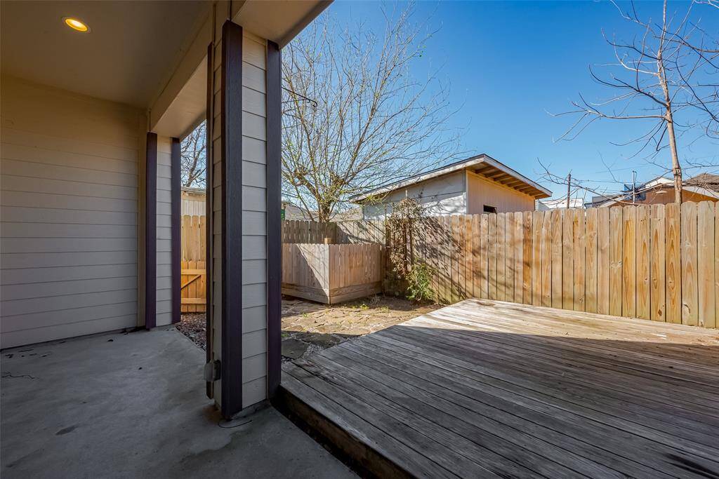 This patio also has recessed lighting and is attached to the decking.
