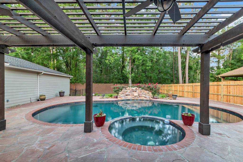 Beat the summer heat in your own private pool with attached spa.