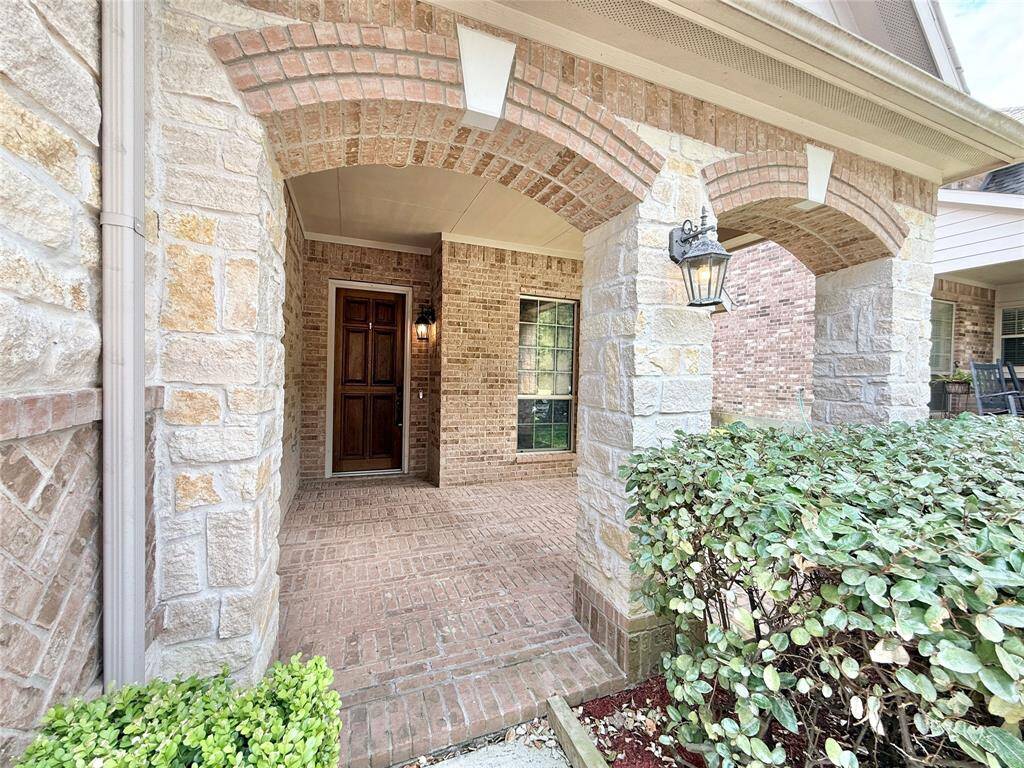 Relax in the shade of the huge covered front porch