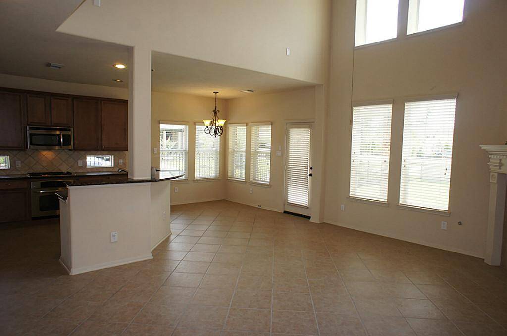 Wall of windows makes this home have a lot of natural light.