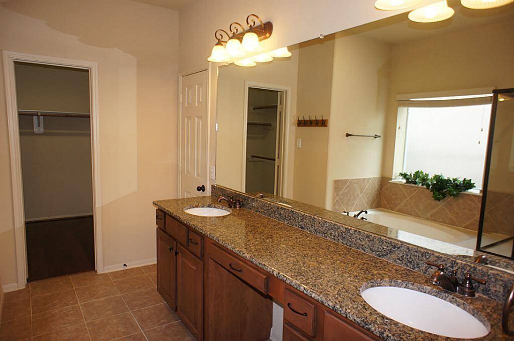 Double sink vanity with Granite Counterspace. Light & Bright!
