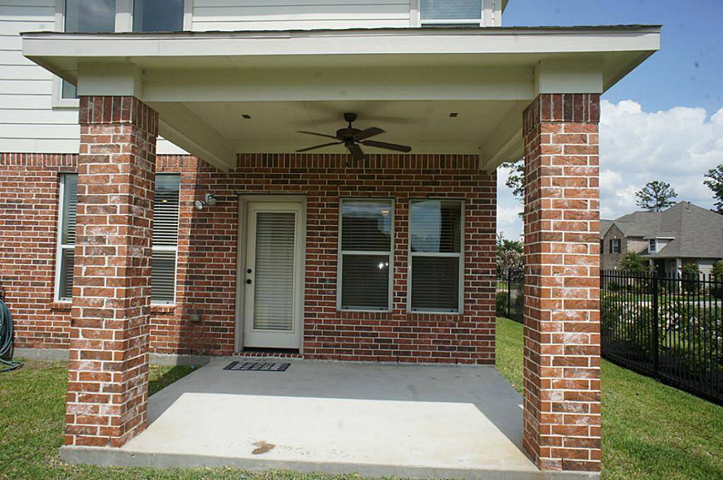 Ample covered back patio that is perfect to sit and enjoy your morning coffee!