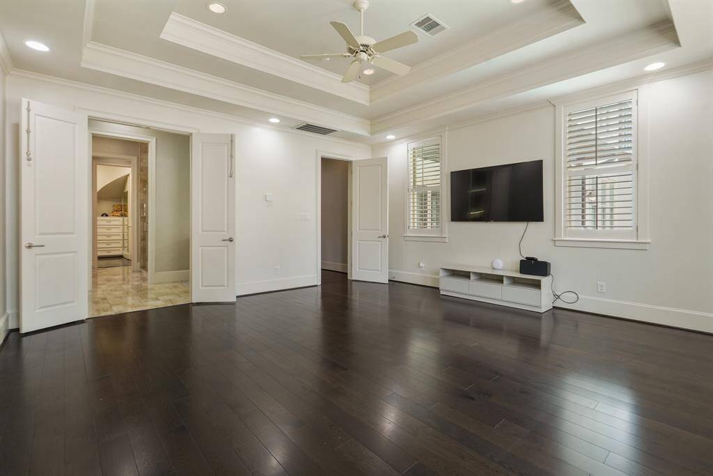 Spacious master suite offering ample room for comfort and relaxation.