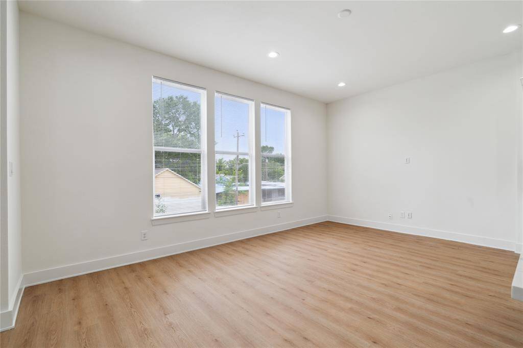 The generous living area offers plenty of room for relaxation and entertainment, with an open, inviting layout that seamlessly connects to the rest of the home. It’s a perfect blend of comfort and style