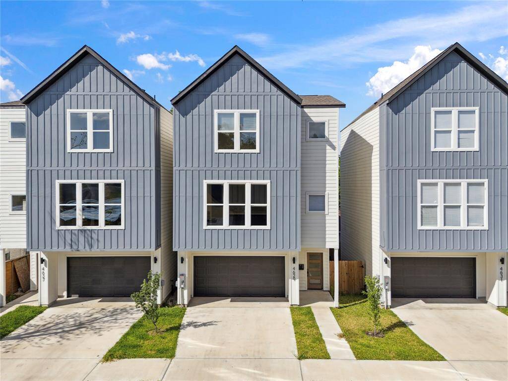 Spacious driveway leads to a 2-car garage, offering plenty of room for parking and easy access to the home. Clean lines and a well-maintained exterior add to the curb appeal