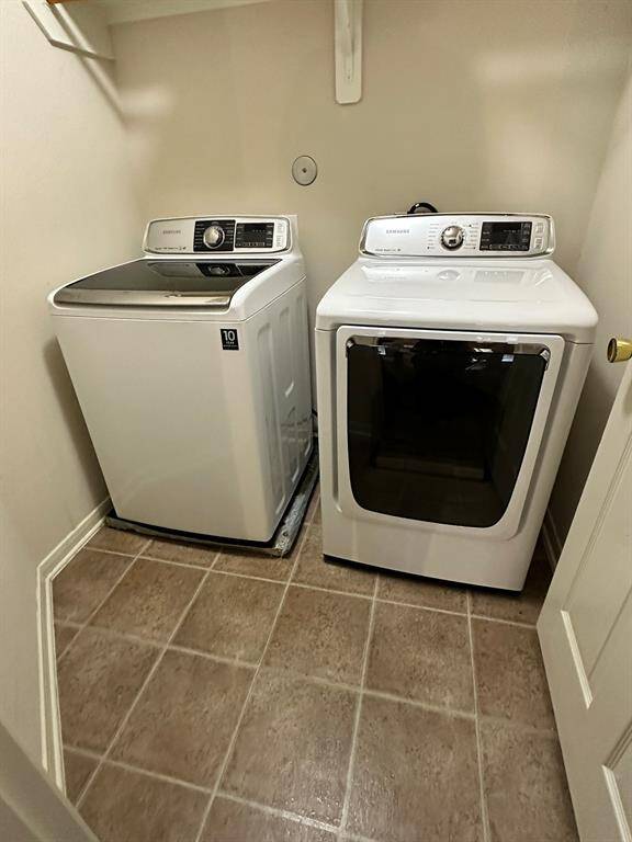 Upstairs laundry includes washer and dryer