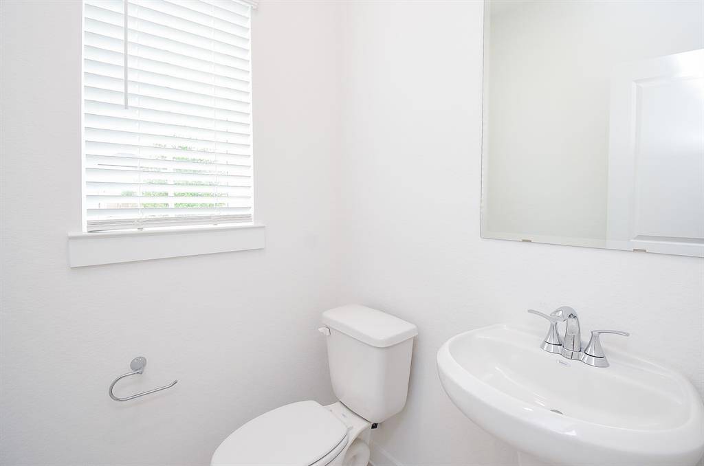 Even this simple half-bath with petite sink, relaxes!