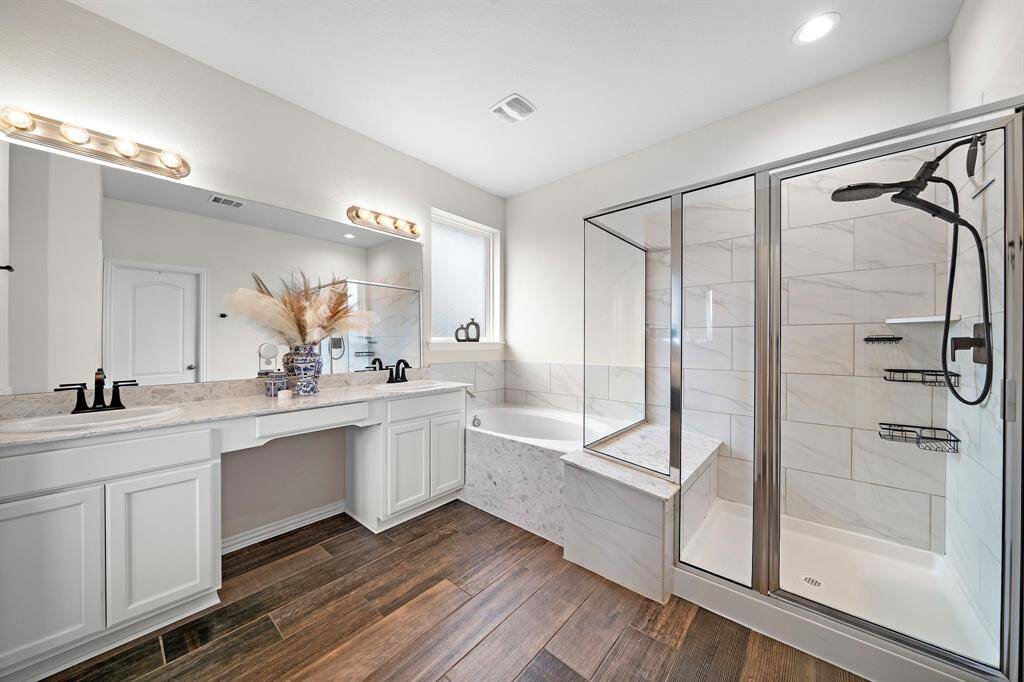 En-suite Bath with separate shower & double sinks