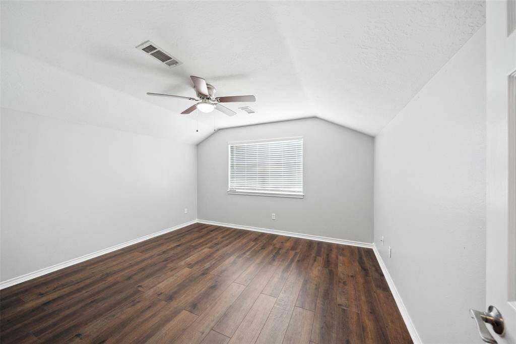 Extra room up is the only room upstairs, the rest of the square footage is down. This room has a small closet next to it so could be used as a fourth bedroom if needed, or a home office or craft/hobby room etc..