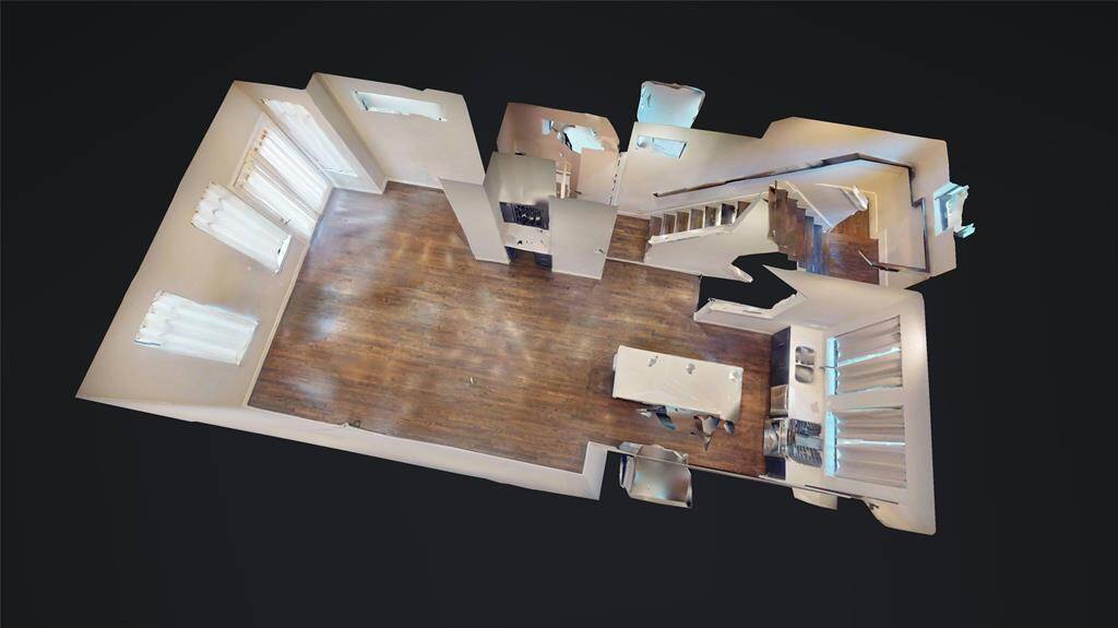 Here's the layout of the second floor: living, dining, and kitchen area... Don't you love these "aerial" shots of the interior??