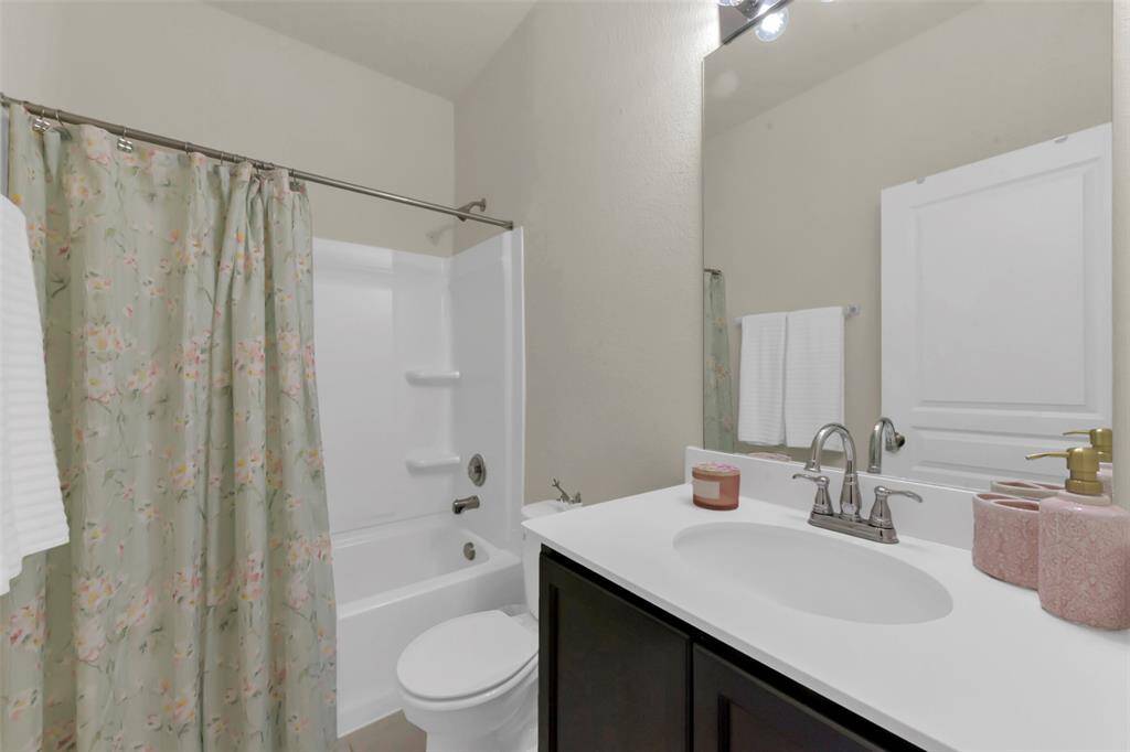 The downstairs full bathroom.