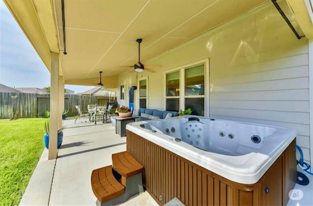 picture yourself sinking into your own private jacuzzi, the warm water melting away the day's stresses. With ample space on the double concrete patio for comfortable seating and dining, this is more than just a backyard – it's your personal retreat