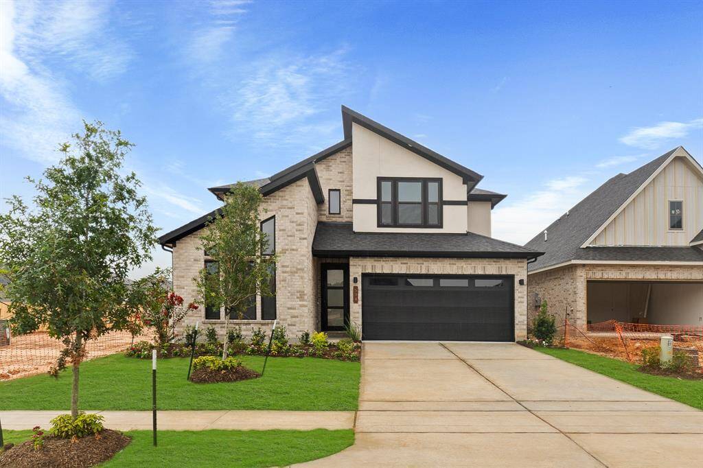 Brick and Stucco on this elegant contemporary home!